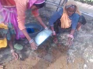 Making floor out of cow dung