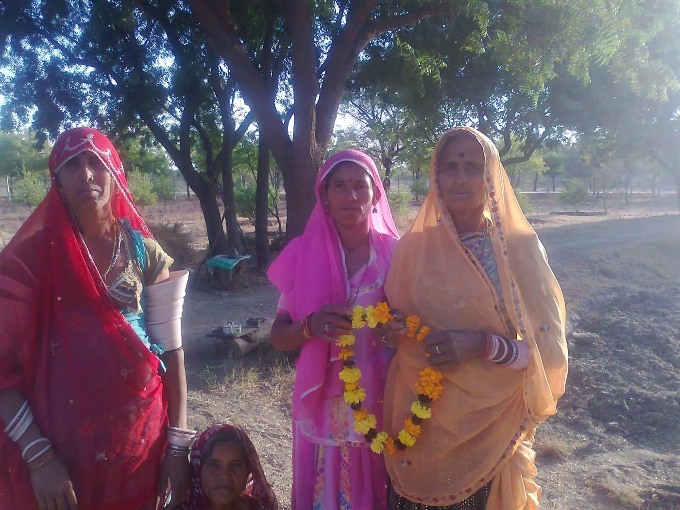 ladies prepared a flower mala for Puspas 49th