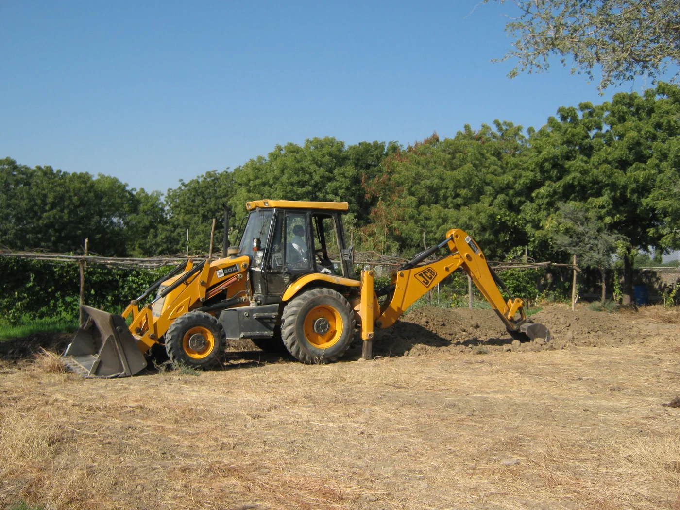 preparing the foundation of a permaculture-style raised bed